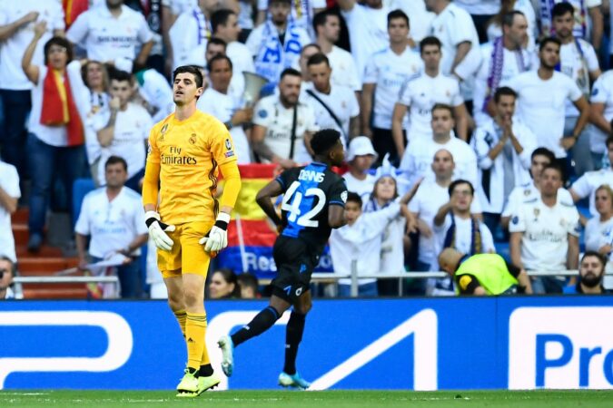 Why does Courtois concede between the legs and how does he compare to a modern goalkeeper?