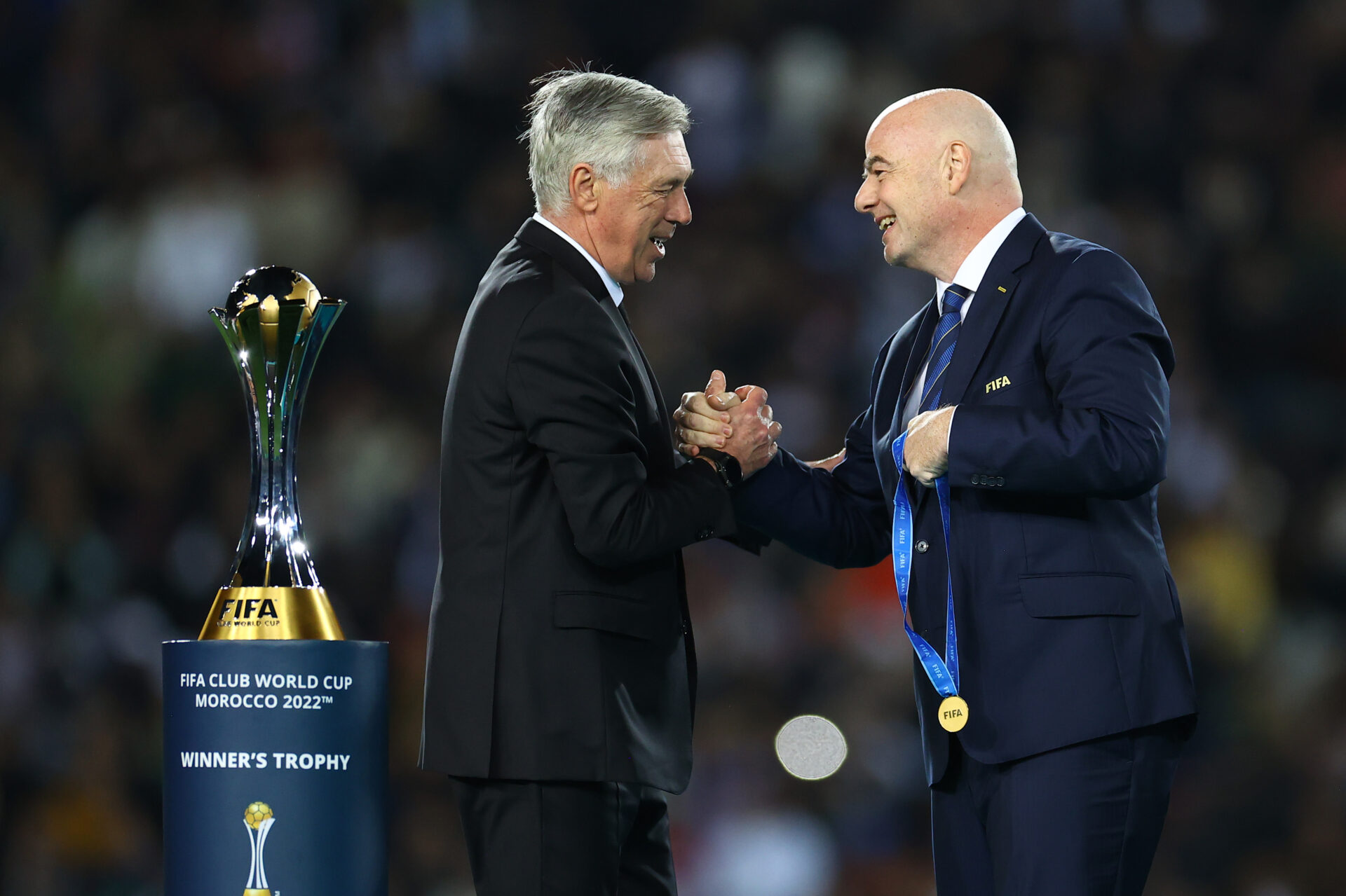 Infantino (FIFA) y Ancelotti (Real Madrid).