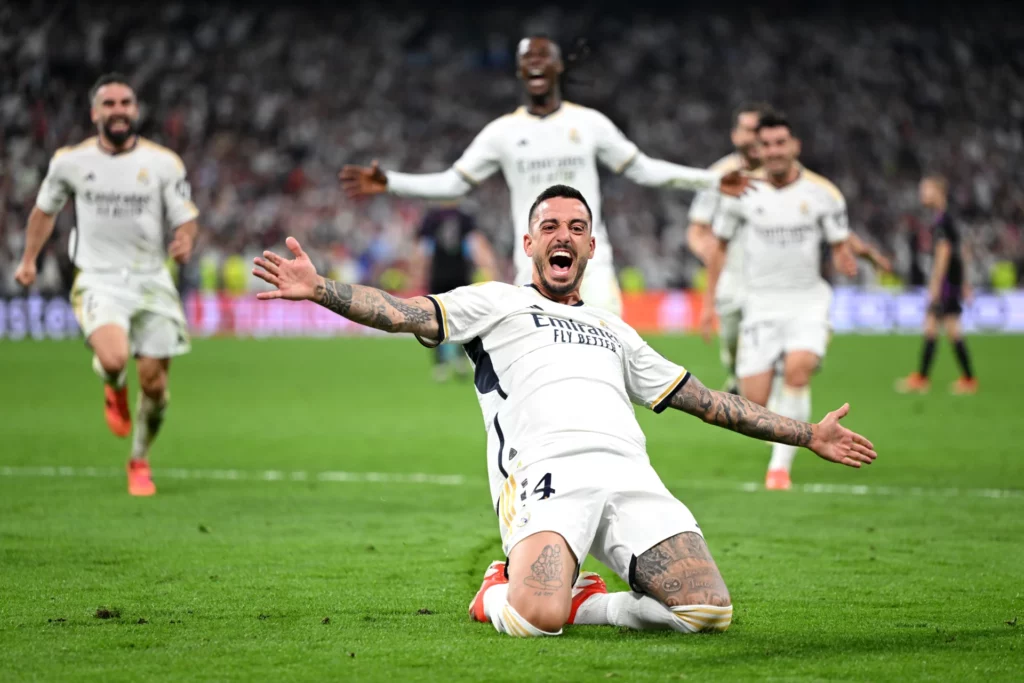 Joselu celebra uno de sus dos goles al Bayern de Múnich en el Santiago Bernabéu.